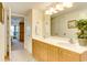 Bright bathroom features double sinks, light wood cabinets, and a neutral color scheme at 502 48Th Ave. S # 402, North Myrtle Beach, SC 29582