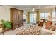 Open-concept living room featuring a ceiling fan and access to a private balcony at 502 48Th Ave. S # 402, North Myrtle Beach, SC 29582