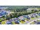 Aerial neighborhood view features well-manicured lawns, mature trees, and a tranquil pond in the background at 537 Indigo Bay Circle, Myrtle Beach, SC 29579