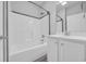 Bright bathroom featuring a shower-tub combination, framed mirror, and vanity with white cabinets at 537 Indigo Bay Circle, Myrtle Beach, SC 29579