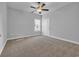 Bright bedroom features a ceiling fan and a window, providing a comfortable and airy feel at 537 Indigo Bay Circle, Myrtle Beach, SC 29579