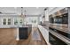 Modern open concept kitchen featuring an island with seating and stainless steel appliances at 537 Indigo Bay Circle, Myrtle Beach, SC 29579
