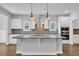Modern kitchen with a large island, stainless steel appliances, and pendant lighting at 537 Indigo Bay Circle, Myrtle Beach, SC 29579