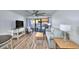 Cozy living room with comfortable furniture and a sliding glass door leading to the balcony at 5511 North Ocean Blvd. # 105, Myrtle Beach, SC 29577