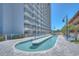 Resort style pool featuring an inground spa and plenty of lounging areas at 5511 North Ocean Blvd. # 105, Myrtle Beach, SC 29577