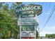 A large sign marks the Hammock Shops Village, established in 1938 at 56 Henderson Way, Pawleys Island, SC 29585