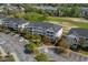 Aerial shot of condos near a golf course; a serene and picturesque community perfect for relaxation and recreation at 5751 Oyster Catcher Dr. # 431, North Myrtle Beach, SC 29582