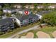 Aerial of condos, golf, and pond views, showcasing a lush, amenity-rich community perfect for a tranquil lifestyle at 5751 Oyster Catcher Dr. # 431, North Myrtle Beach, SC 29582