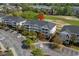 Aerial shot of condos near a golf course; a serene and picturesque community perfect for relaxation and recreation at 5751 Oyster Catcher Dr. # 431, North Myrtle Beach, SC 29582