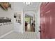 Inviting entryway with tile floors, arched doorway, and a glimpse of the living room and patio beyond at 5751 Oyster Catcher Dr. # 431, North Myrtle Beach, SC 29582