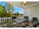 Covered patio with wicker furniture and a view of the golf course at 5751 Oyster Catcher Dr. # 431, North Myrtle Beach, SC 29582