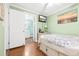 Bedroom with hard wood floors and access to the bathroom at 6001-1592 South Kings Hwy., Myrtle Beach, SC 29575
