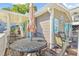 Outdoor deck features an umbrella-shaded table with seating for enjoying sunny days at 6001-1592 South Kings Hwy., Myrtle Beach, SC 29575