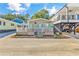 Charming home featuring a cozy front porch with white railing and blue shutters at 6001-1592 South Kings Hwy., Myrtle Beach, SC 29575