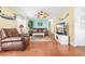 Comfortable living room with hardwood floors, a ceiling fan, and a casual coastal vibe at 6001-1592 South Kings Hwy., Myrtle Beach, SC 29575