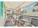 Covered porch with seating offering a relaxing outdoor space with a view of the community at 6001-1592 South Kings Hwy., Myrtle Beach, SC 29575