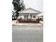 Charming home featuring a cozy front porch with brown wood trim at 6001-5117 S Kings Hwy., Myrtle Beach, SC 29575