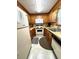 Efficient kitchen featuring wood cabinets, white appliances, and ample counter space at 6001-5117 S Kings Hwy., Myrtle Beach, SC 29575