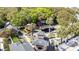 Scenic aerial view of a beautifully landscaped miniature golf course surrounded by lush trees and charming buildings at 6001-5117 S Kings Hwy., Myrtle Beach, SC 29575