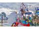 Colorful water park featuring a pirate ship themed structure with slides and a tipping bucket for refreshing Gathering fun at 6001-5117 S Kings Hwy., Myrtle Beach, SC 29575