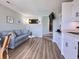 Inviting living area with beachy decor, comfortable seating, and modern appliances at 627 N Waccamaw Dr. # 203, Murrells Inlet, SC 29576