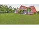 Large, well-maintained backyard featuring lush green grass and mature trees at 632 Serendipity Circle, Murrells Inlet, SC 29576