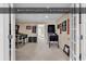 Spacious bonus room featuring pinball machines and memorabilia, perfect for entertainment and relaxation at 632 Serendipity Circle, Murrells Inlet, SC 29576