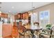 Eat-in kitchen with a dining table, lots of light, and stainless steel appliances at 632 Serendipity Circle, Murrells Inlet, SC 29576