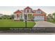 Charming two-story home with a well-manicured lawn and attached two-car garage at 632 Serendipity Circle, Murrells Inlet, SC 29576