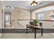 Open hallway with an archway, neutral walls, and a decorative table with plants at 632 Serendipity Circle, Murrells Inlet, SC 29576