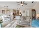 Open concept living space with modern furnishings, kitchen, and dining area at 679 Riverwalk Dr. # 202, Myrtle Beach, SC 29579