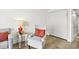 Comfortable seating area with stylish chairs, side table, and modern decor at 7200 Ocean Blvd. N # 664, Myrtle Beach, SC 29572
