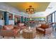 An inviting lounge area with plush leather armchairs, a wooden table, and a stylish bar area for relaxing at 7200 Ocean Blvd. N # 664, Myrtle Beach, SC 29572