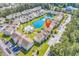 Stunning aerial view of the community and surrounding lush landscapes, pool, pond and residences at 8570 Hopkins Circle # D, Surfside Beach, SC 29575