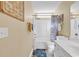 Full bathroom featuring a tub and shower combination with a blue decorative shower curtain at 8570 Hopkins Circle # D, Surfside Beach, SC 29575