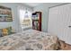 Calm bedroom showcasing beach-themed decor, providing a relaxing and stylish retreat at 8570 Hopkins Circle # D, Surfside Beach, SC 29575