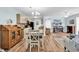 Bright living room displays the open floor plan, stylish furnishings, wood floors and modern decorations at 8570 Hopkins Circle # D, Surfside Beach, SC 29575