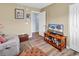 Relaxing living room with comfortable seating, and an entertainment center, perfect for unwinding at 8570 Hopkins Circle # D, Surfside Beach, SC 29575