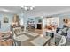 Bright open floor plan showcases the modern design, stylish furniture, hardwood floors and decorations at 8570 Hopkins Circle # D, Surfside Beach, SC 29575