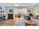 Bright living room with fireplace and comfortable seating at 8570 Hopkins Circle # D, Surfside Beach, SC 29575