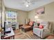 Bright home office with ample natural light, desk space, and comfortable seating, perfect for work at 8570 Hopkins Circle # D, Surfside Beach, SC 29575