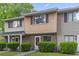 Charming two-story townhome with brick and wood facade, complemented by well-maintained landscaping and a quaint walkway at 86 Beaver Pond Loop # 33, Pawleys Island, SC 29585