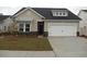 Charming single-Gathering home with a two-car garage and well-maintained landscaping at 8727 Baton Rouge Ave Nw, Calabash, NC 28467