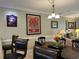 Dining area with table, chairs and flowers at 1000 Ray Costin Way # 114, Murrells Inlet, SC 29576