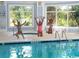Bright indoor pool with ample natural light, perfect for year-round enjoyment and recreation at 1000 Ray Costin Way # 114, Murrells Inlet, SC 29576