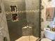 Stylish tiled shower with corner seat and shampoo niche at 1000 Ray Costin Way # 114, Murrells Inlet, SC 29576