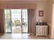 Bright sunroom with wicker furniture, perfect for relaxing or entertaining at 1000 Ray Costin Way # 114, Murrells Inlet, SC 29576