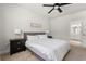 Cozy bedroom with neutral colors, a ceiling fan, and soft natural light at 1087 Baker Creek Loop, Myrtle Beach, SC 29579