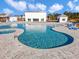 The community pool has crystal-clear water, a hot tub, zero entry, and ample lounge chairs for relaxation at 1087 Baker Creek Loop, Myrtle Beach, SC 29579