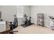 This exercise room offers lots of light and a space for all of your fitness needs at 1087 Baker Creek Loop, Myrtle Beach, SC 29579